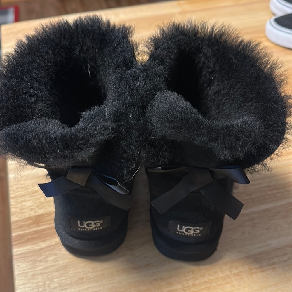 Bow back black UGG half boots
